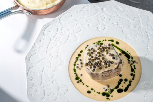 Beef tenderloin steak with potato foam and butter roasted cauliflower